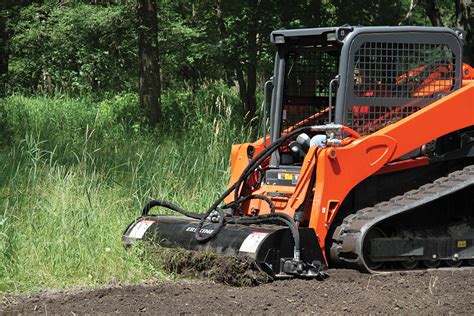 clearing brush with the kubota skid steer|kubota skid steer tiller attachment.